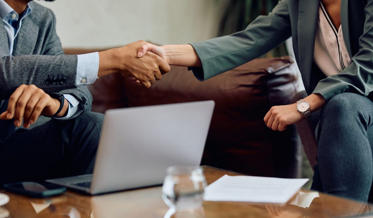 Close,Up,Of,Business,Colleagues,Shaking,Hands,During,A,Meeting. Close,Up,Of,Business,Colleagues,Shaking,Hands,During,A,Meeting.